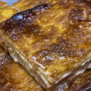 Trancio parigina con prociutto, formaggio, pomodoro