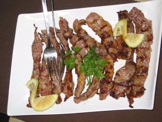 Lagartos de porco preto grelhado
