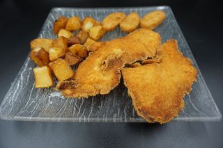 Pit Pollastre Arrebossat amb Nuggets I Patates