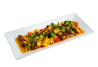 Calamaretti spillo alla “Sorrentina” con pomodori Secchi olive nere Teggiasche e Capperi del “Vesuvio”