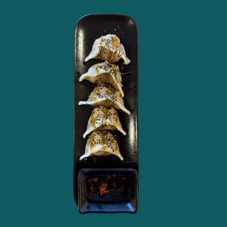 Gyozas De Pollastre con cebolla caramelizada.(5 Uds.) 