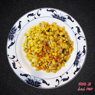 Mais saltato con pinoli