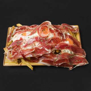 Huevos rotos con jamón (1/2 ración)