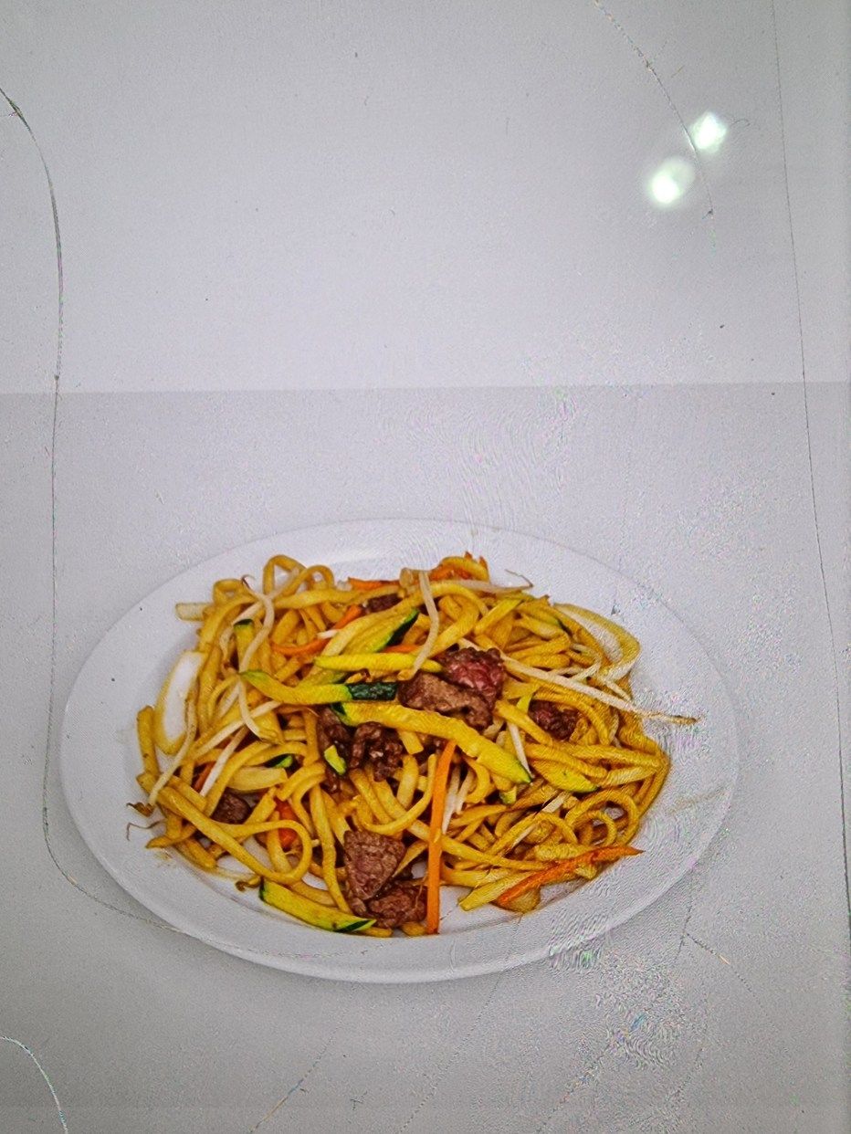 Tallarines fritos con ternera
