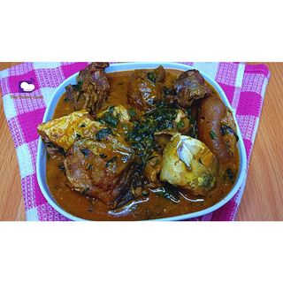 Ogbono soup+1 beef or goat semo or eba