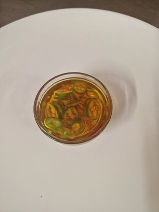 Ardei iute în ulei aromatizat