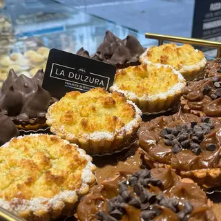 Porción de tarta  de Coco y Dulce de leche 