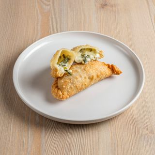 Empanada formaggio e cipolla