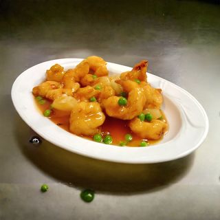 Gamberi con piselli e mais