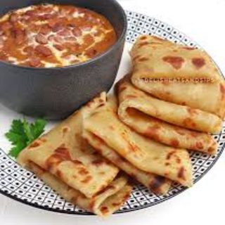2 chapati, coconut beans and soda