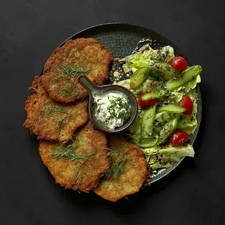 Draniki. 4 hot potato pancakes.