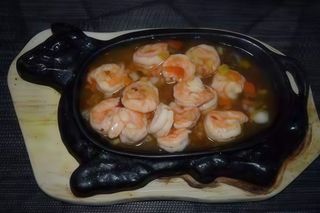 Gamberetti alla piastra con cipolla