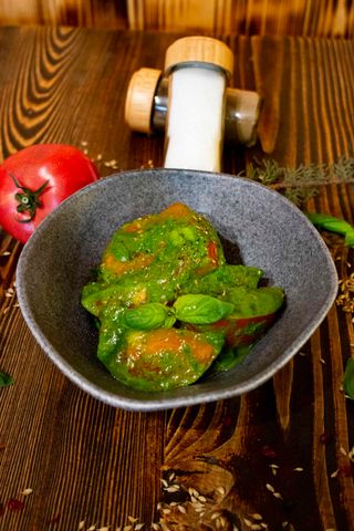 Tomatoes with pesto sauce