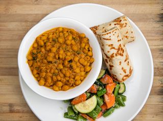 Chickpea Curry With fried mchicha.
