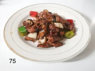 75. Manzo con fagioli neri