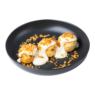 Сирники з кремом та вафельною крихтою