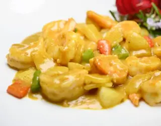 Gamberetti in salsa curry