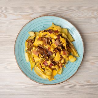 Patate dippers con pulled pork home made, cheddar e bacon