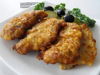 Відбивна свиняча з соусом (100/50г)