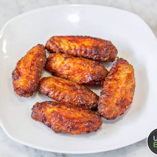 Alitas Tutto Premium (10 unidades) con Guarnición
