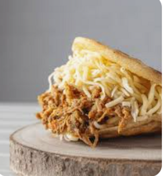 Arepa Rellena De Pollo Y Queso