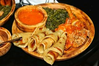 Chapati... chicken stew and greens 