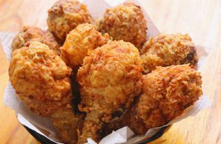 Cosce di pollo fritte