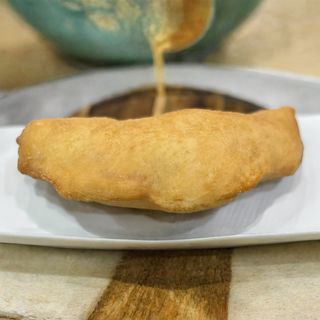 Panzerotto -11, cime di rapa e salsiccia