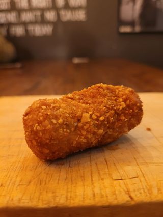 Cerdo con cerveza y pistachos