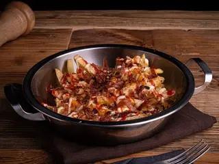 Bacon cheese fries with sriracha sauce and truffle mayo