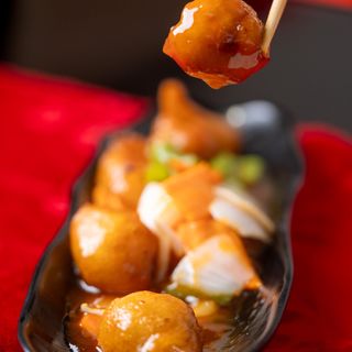 102. Pollo con salsa agridulce