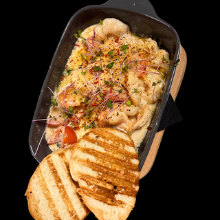 Тигрові креветки запечені з пармезаном