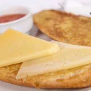 Tostada de queso manchego y aceite de oliva