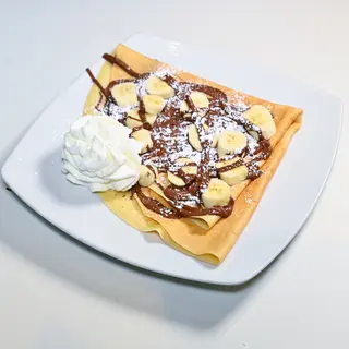 8 - Nutella, tondini di banana, panna e zucchero a velo