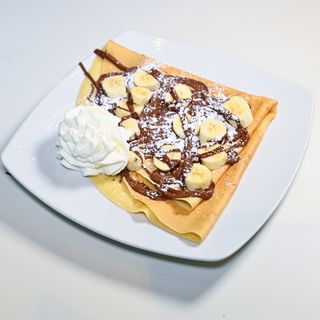 8 - Nutella, tondini di banana, panna e zucchero a velo