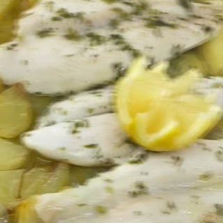 Merluza con patata. Al horno