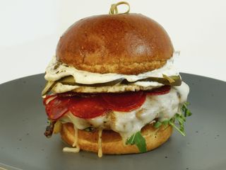Бургер яловичий з соусом карі (0.490g)