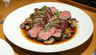 Телешки език с манатарки