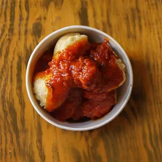 Zeppoline ragù e parmigiano