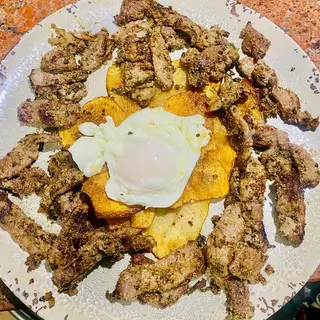 Taquitos de añojo al ajillo 