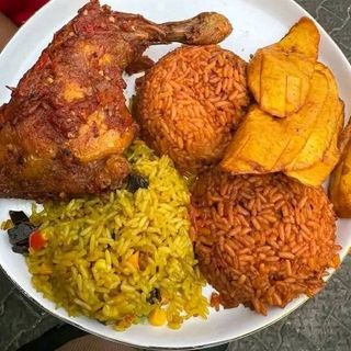 Half Jollof Rice, Half fried rice with plantains and peppered chicken 