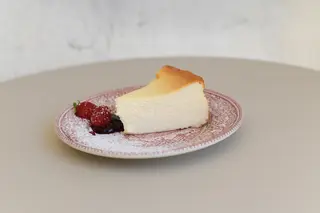 Cheesecake horneado porción