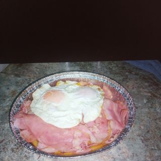 Plato De Bacon Con 2 Huevos Y Patatas