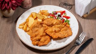 COTLET DE PORC PANINAT CU CARTOFI WEDGES