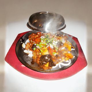 Porc pe plita incinsa