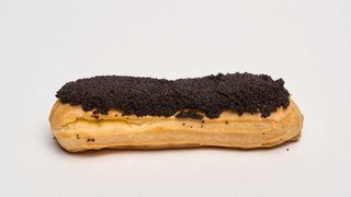 Эклер с маком (100 гр.)