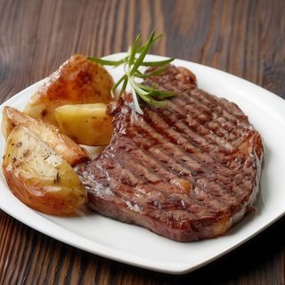 Bistec con patata al horno