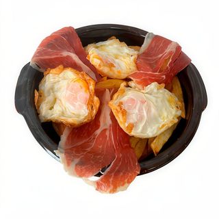 Ración Cojonuda De Huevos Estrellados Con Jamon Ibérico