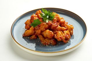 Курица в кляре под остро-сладким соусом (300г)