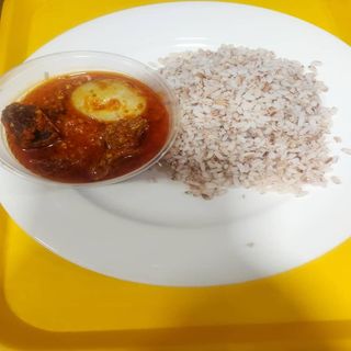 Ofada rice and sauce (assorted meat and egg)